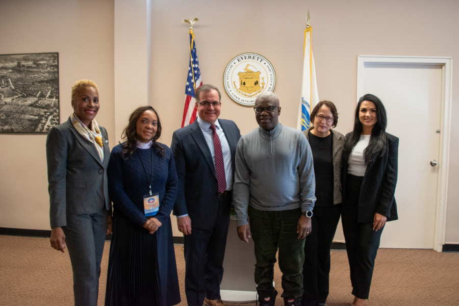 The Mayor and City Councilors pose with community leaders.