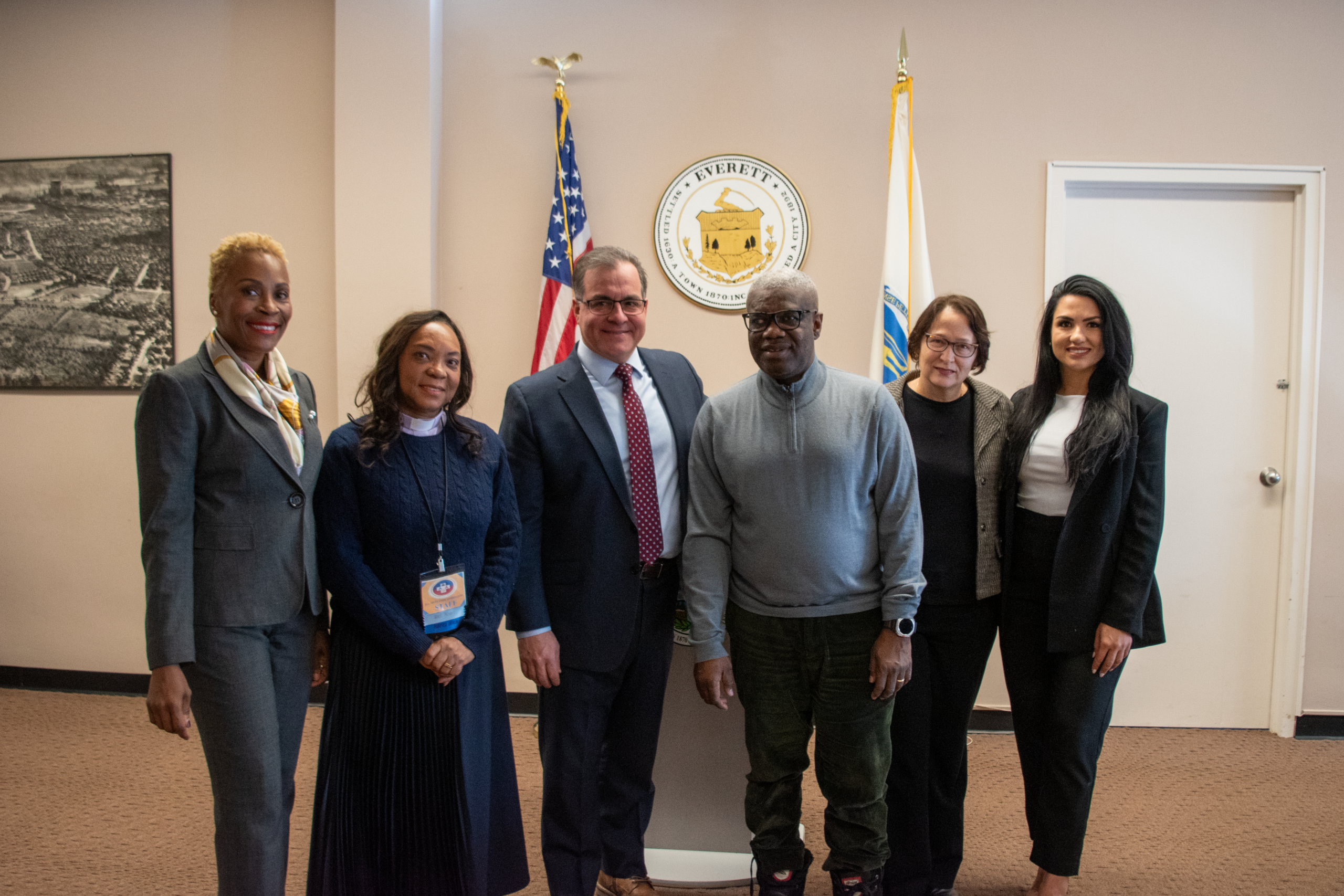 The Mayor and City Councilors pose with community leaders.