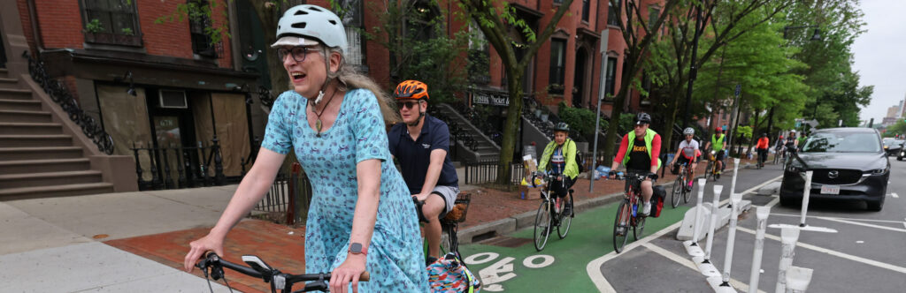 Bikers ride down Tremont St. in the South End.