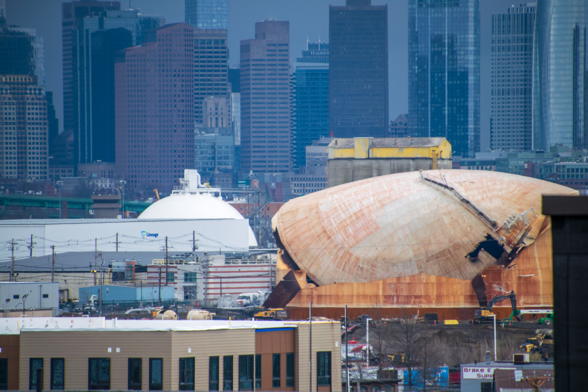 Drone shot of tank being torn down, looks almost like it's melting