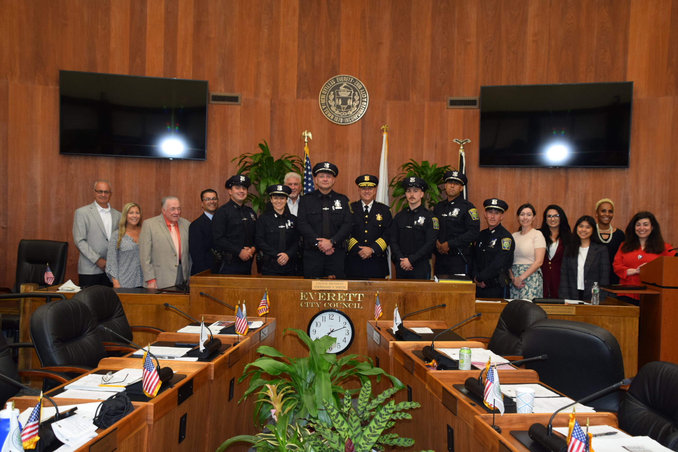 Six New Officers gathered with City Council members in City Council Chambers