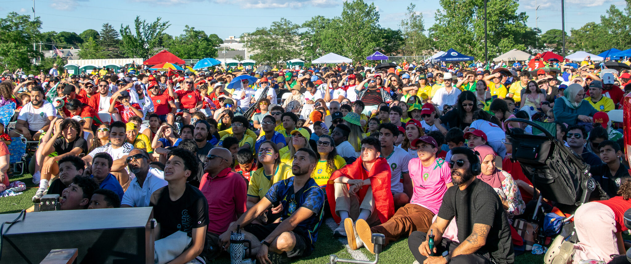 Attendees watch the Brazil vs. Morocco match at Everett Fan Fest.