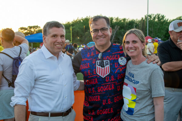 State Senator Sal DiDomenico, Mayor Van Campen, and First Lady Van Campen pose during Fan Fest.