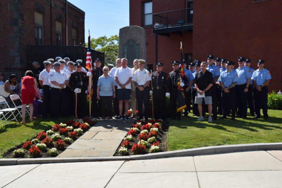 Everett Fire Department and Everett Fireman's Relief Association gather for a group picture in front of the Everett Fire Memorial