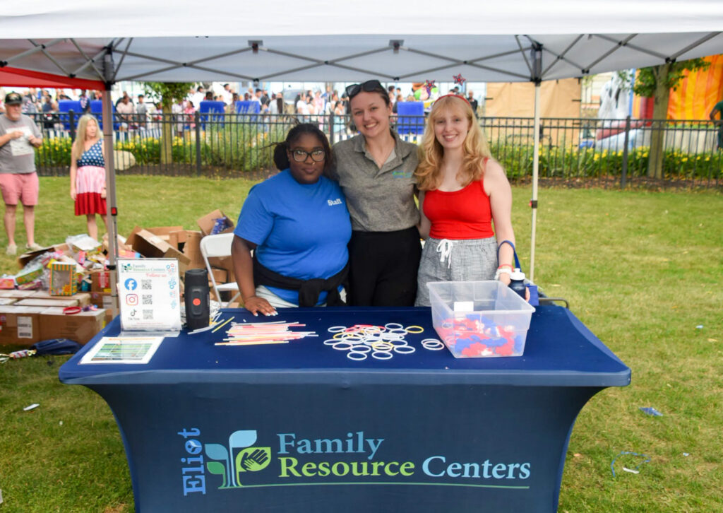 EFRC staff poses at their booth.
