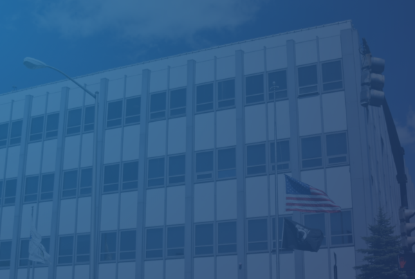 Everett City Hall with a blue gradient overlay.