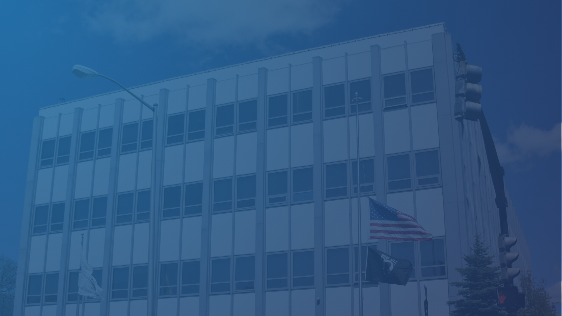 Everett City Hall with a blue gradient overlay.