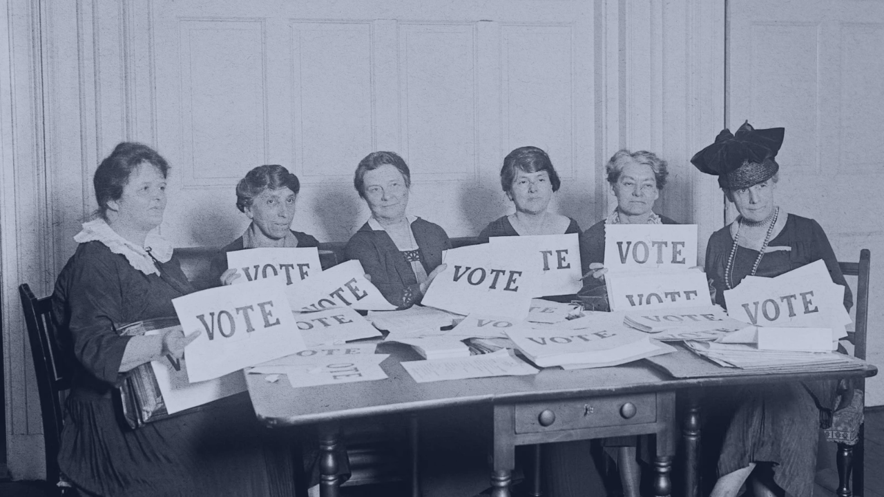 National League of Women Voters holding "VOTE" signs in 1924.